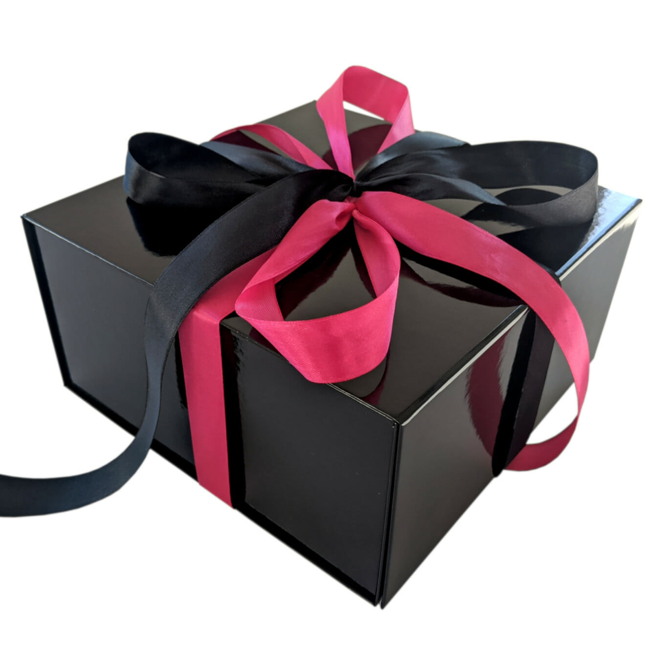 Schwarze Geschenkschachtel mit pinker Schleife