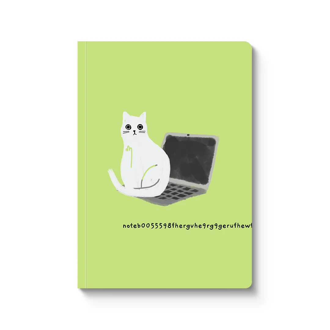 Katze auf Laptop